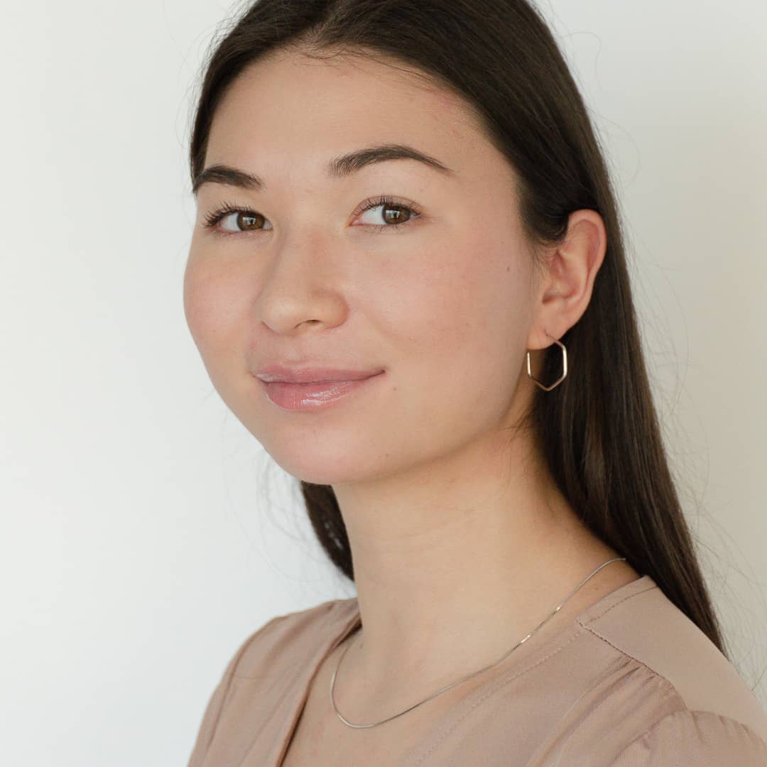 model wearing sterling silver rhodium  micro chain necklace