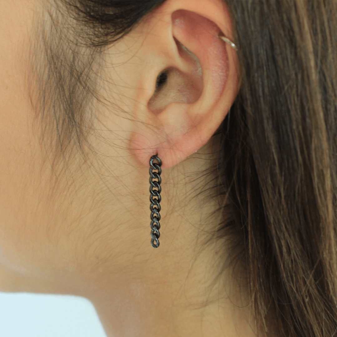 woman wearing sterling silver gun metal black plated curb chain earrings